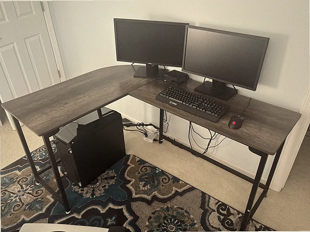 2 Gaming computers, 4 monitors, keyboard, mouse, headset, and a L-Shaped Desk