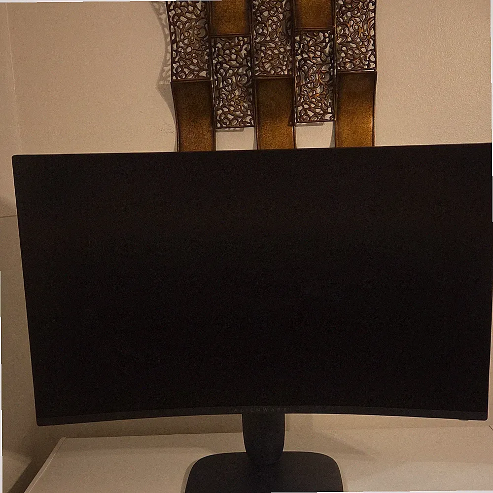 A Alienware 32 inch Curved Gaming Monitor with 144hz